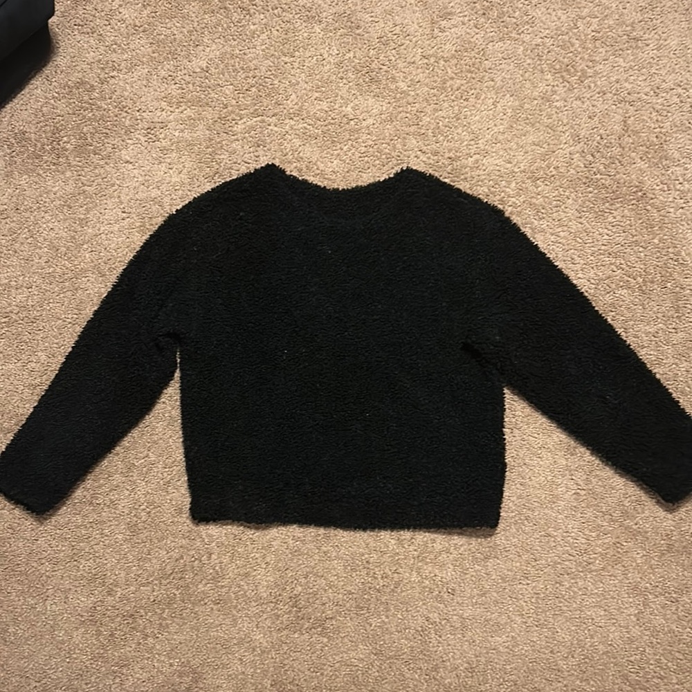 Black Uniqlo sweater, size small. Fleece-like material on the inside.